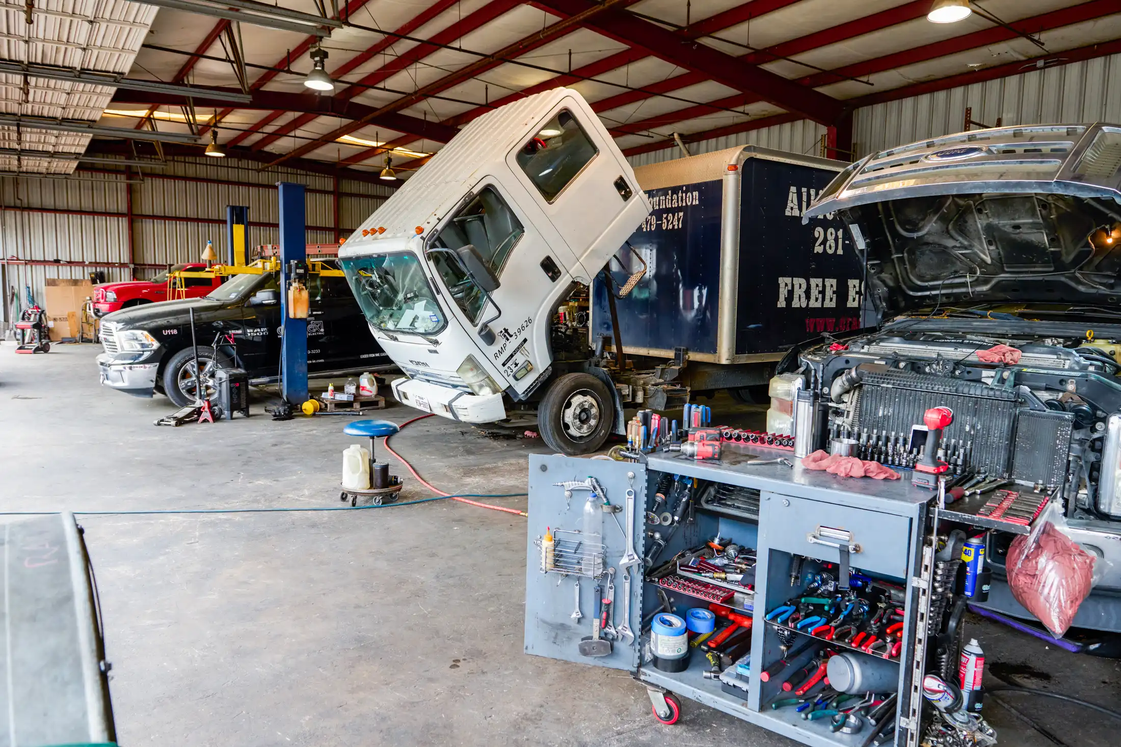 Inside the truck repair shop at Houston Performance Diesel